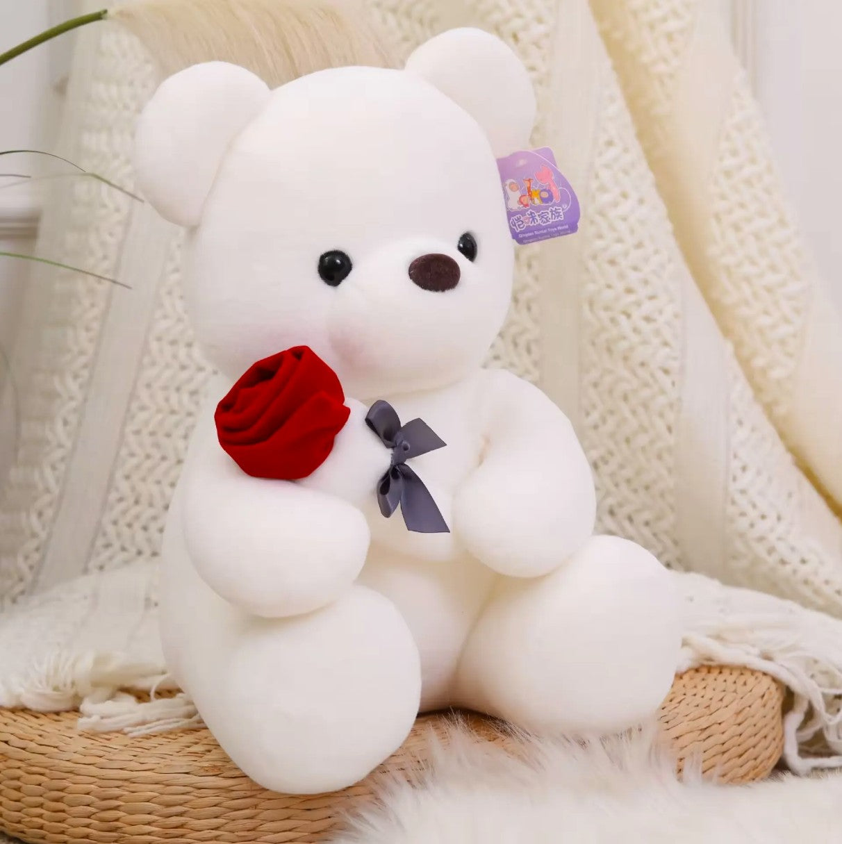 Adorable Teddy Bear Holding a Rose