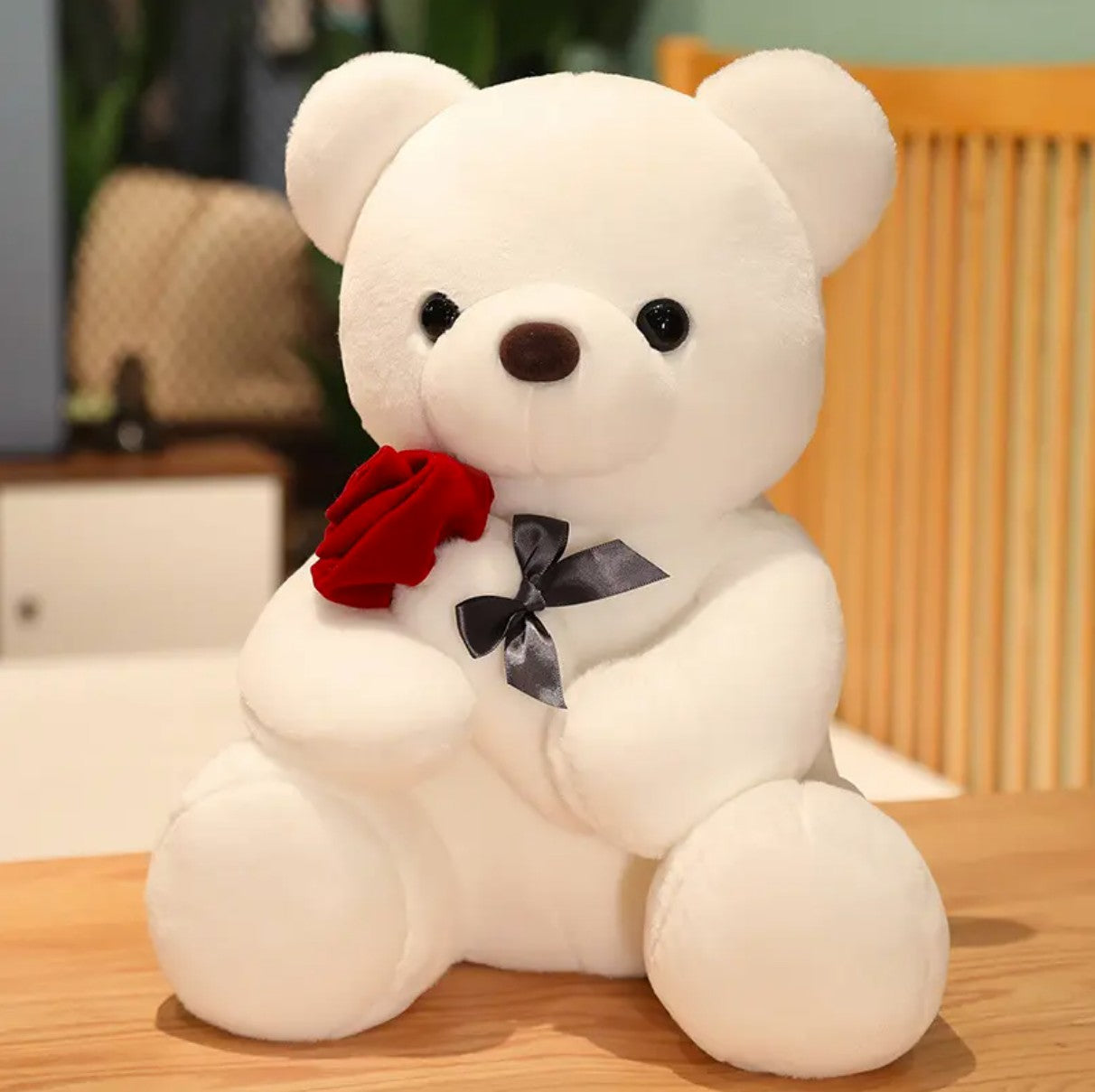 Adorable Teddy Bear Holding a Rose